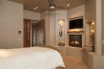 Bedroom 2 has a queen size bed with a gas fireplace and flat screen TV
